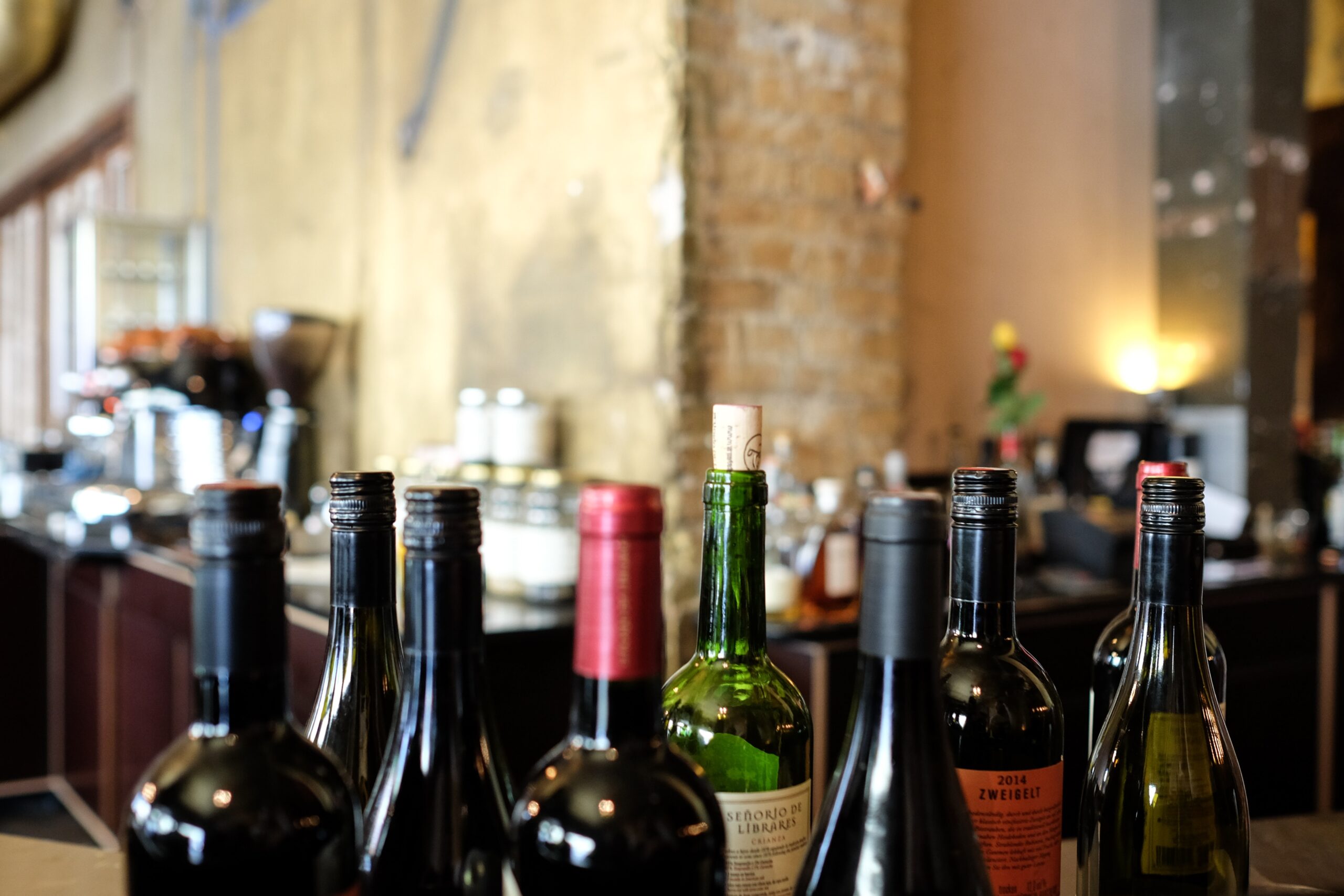 A selection of wine bottles seen from their neck up