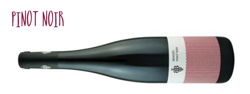 Bottle of Andreas Bender Pinot Noir on its side with its distinctive red and white label