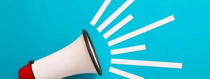Red & white megaphone against a bright blue background
