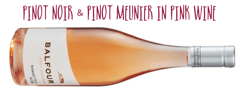 Bottle of Balfour Hush Heath Estates Nanette's Rosé on its side captioned Pinot Noir and Pinot Meunier in pink wine