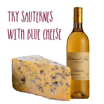 Large piece of blue Shropshire cheese and a half bottle of Sauternes captioned "Try Sauternes with blue cheese"