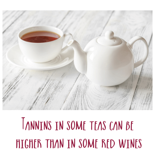 White tea pot and cup of black tea captioned Tannins in some teas can be higher than in some red wines