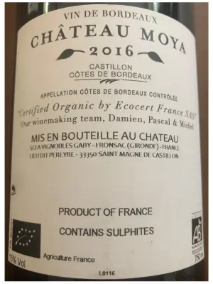 Wine label for Chateau Moya wine that has the symbol for Organic wine on it and reads "Contains sulphites"