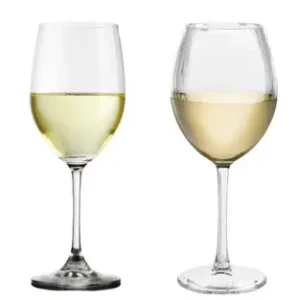 A glass of lemon coloured white wine next to a glass of gold coloured white wine