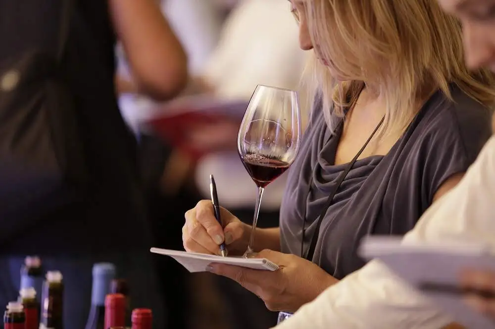 Wines With Attitude founder Lindsay Cornelissen tasting wine