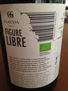 Back label of Domaine Gayda Figure Libre wine with green leaf organic wine logo