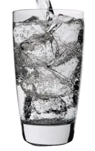 Glass of sparkling wine spritzer with ice