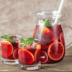 Jug and two glasses of red wine sangria