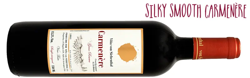 Bottle of Von Siebenthal Carmenere on its side with caption Silky smooth Carmenere