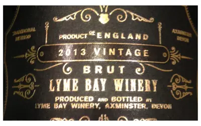 Black and gold label of Lyme Bay Classic Cuvée sparkling wine