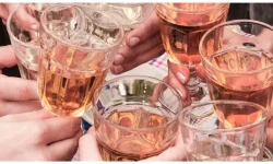 Glasses of rosé being clinked together
