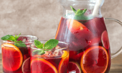 Jug and two glasses of red wine sangria